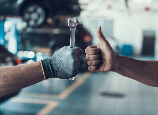 slide-107287098 auto mechanics give thumbs up